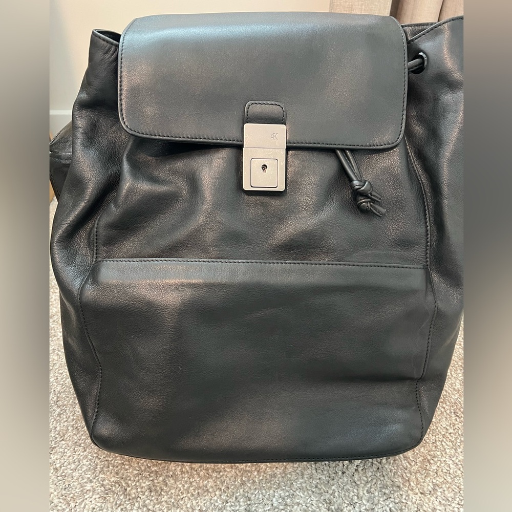 Vintage Calvin Klein Black Leather Backpack. Adjustable Straps. Lockable w/ Key.